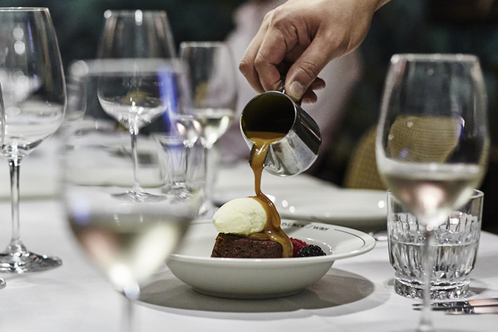 The sticky date pudding with ice cream. Berries are serving suggestion. Photography: Wong Weiliang.