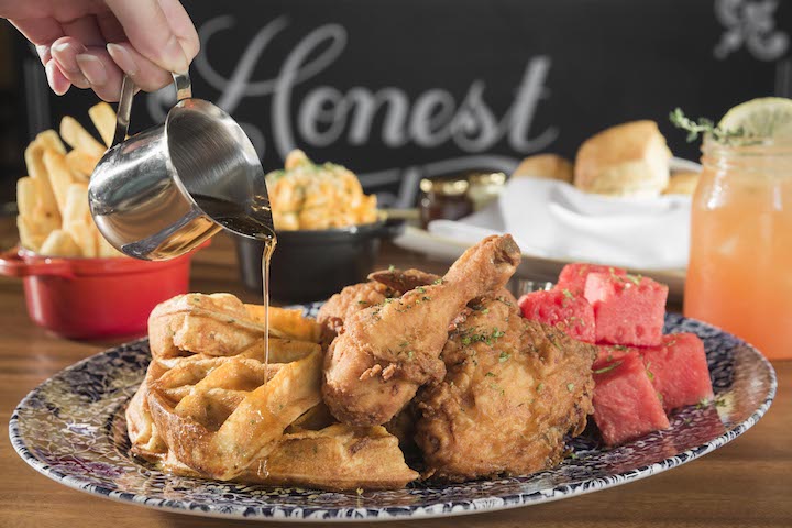 At The Bird, Southern fried chicken is served with refreshing cubes of watermelon and savoury waffles