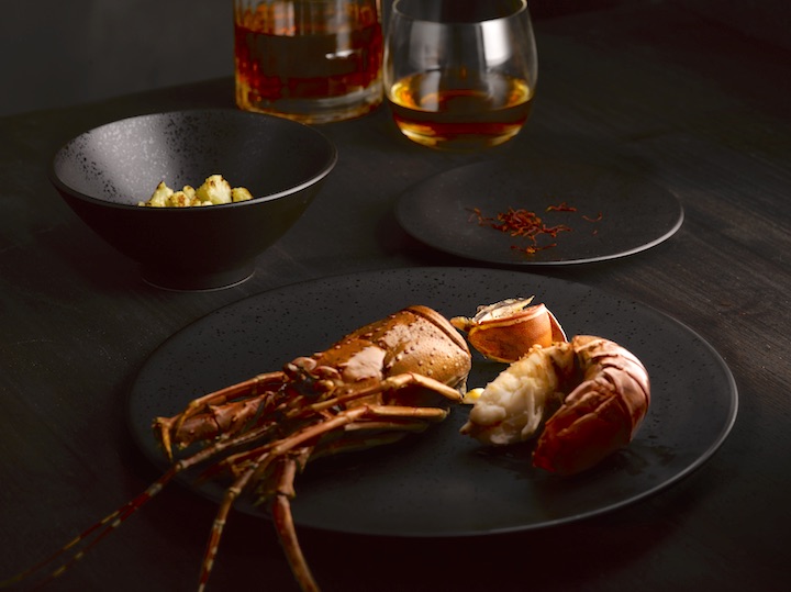 Earthy shades of umber add a touch of glamour to formal dinner plates.