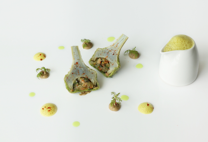 Herb-crusted purple artichoke, turmeric emulsion and marigold on the four-course children's menu at Saint Pierre.