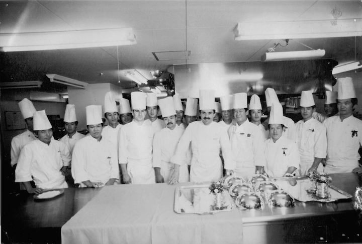 No man is an island: Bouchet believes in the importance of building a strong team, like this one in Tokyo.
